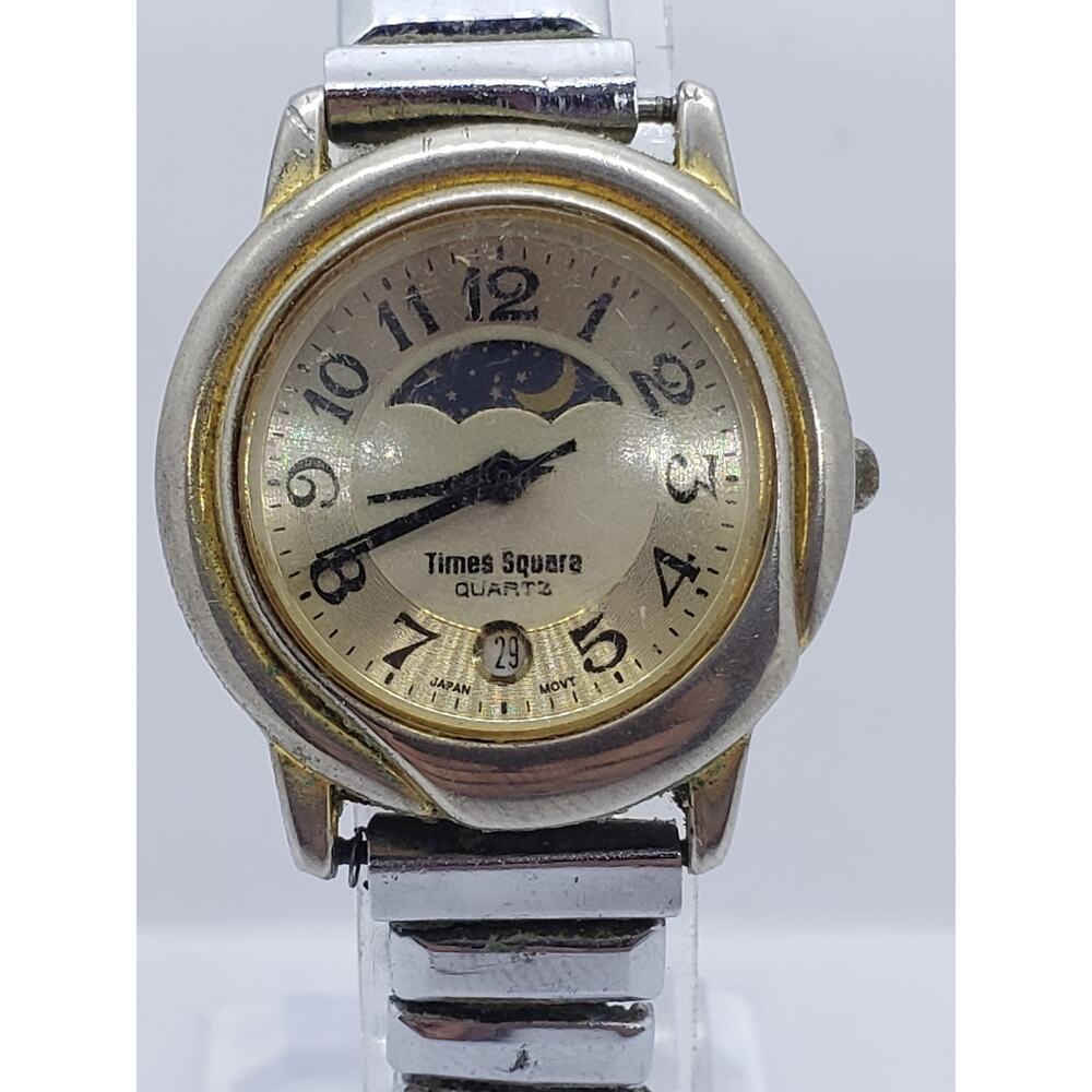 Times Square women's watch 5241. Sun and moon dial on face with Calendar date